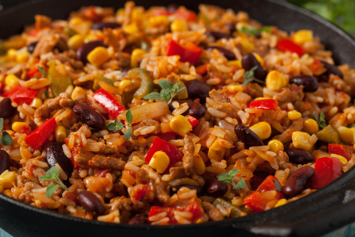 Close-up of Spicy Mexican Rice Pilaf - spicy rice, black beans, corn, and peppers in a savory chili sauce.