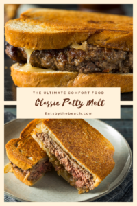 A classic patty melt of grilled sourdough bread, ground beef patty, caramelized onion, and cheese on a white plate