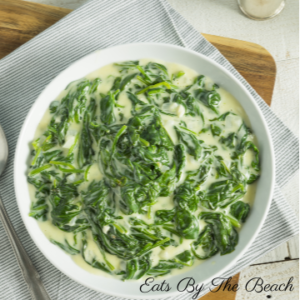 Easy side dish. A white bowl of steakhouse creamed spinach.