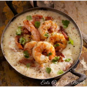 Buttery, sauteed shrimp served over cheesy grits. A Southern Classic.