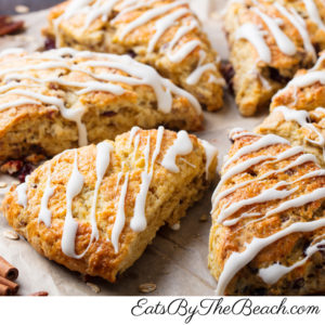 A scone made with oatmeal, dried cranberries, and pecans with a vanilla glaze. Its a perfect grab and go breakfast.