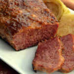 A platter of oven baked corned beef with roasted cabbage slices - A St. Patrick's Day Favorite