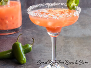 A sweet and spicy cocktail, this margarita is made with guava juice, citrus, and a jalapeno simple syrup. Finish with a salted rim and a slice of jalapeno, and you have a deliciously different margarita.