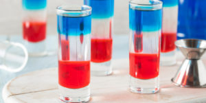 Election Day Shooters - layered grenadine, peach schnapps, and blue curacao. Its one way to get through election night.