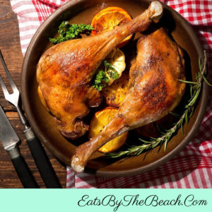 Perfect for a small Thanksgiving gathering - Easy Roasted Turkey Legs flavored with an herb and orange compound butter.