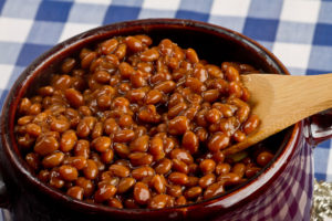 Bean pot of Kansas City Barbecue Beans -beans that are sweet, tangy, spicy, and full of barbecue flavor. Perfect for a Super Bowl party!