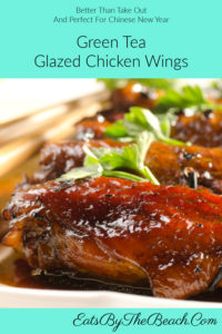 Close-up view of a plate of Green Tea Glazed Chicken Wings - baked chicken wings that are glazed in a spicy, tangy, green tea sauce