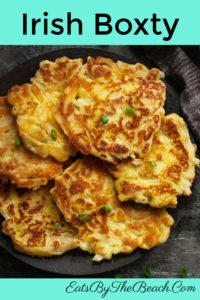 Plate of Irish Boxty, also known as Irish potato pancakes.  Tender and fluffy on the inside and golden and crispy on the outside.  They are great to serve for St. Patrick's Day.