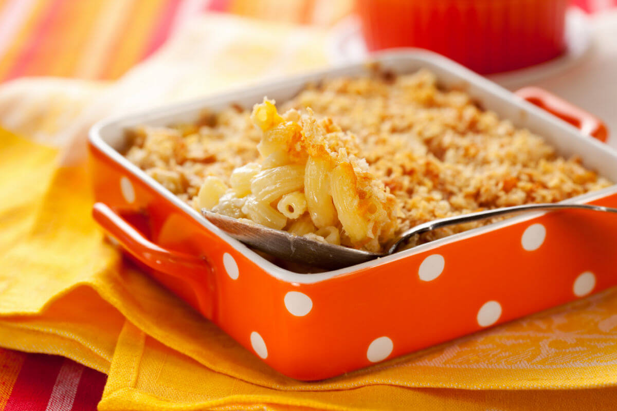 Baking dish of Classic Macaroni And Cheese with a buttery crumb topping