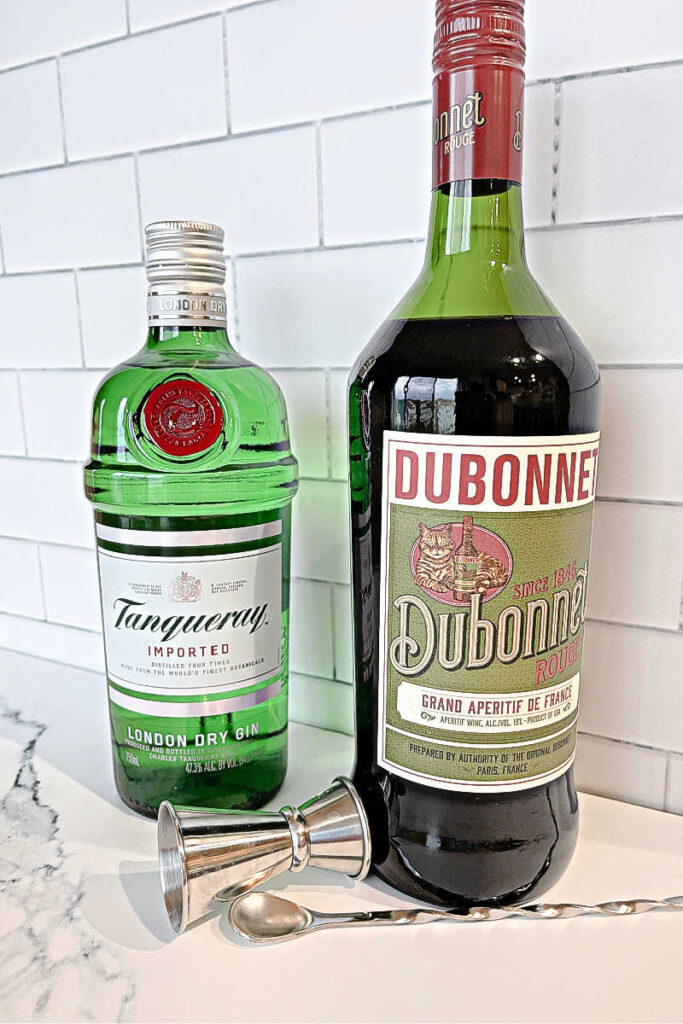 The Queen's And Gin with Lemon Twist