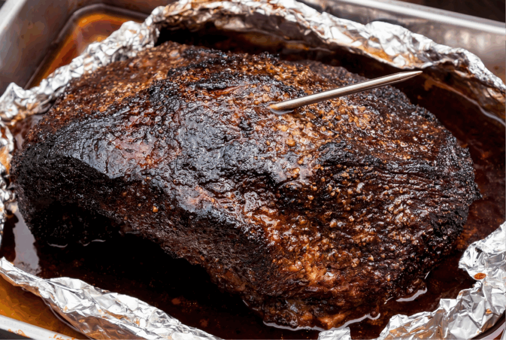 Whole oven roasted beef brisket, good bark, and glossy wit fatty juices.